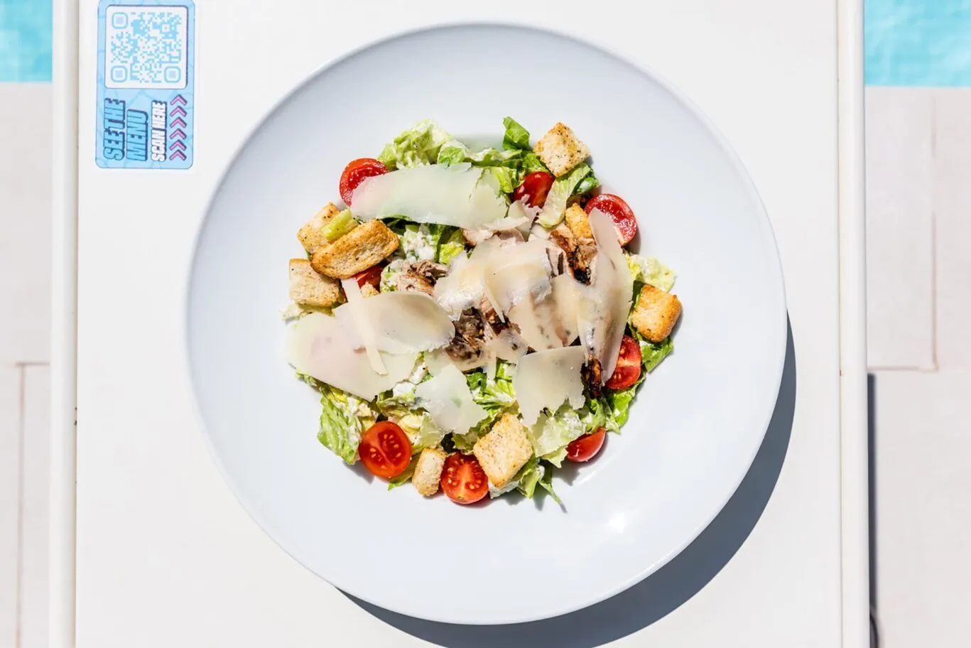 chicken caesar salad food at the chill out pool