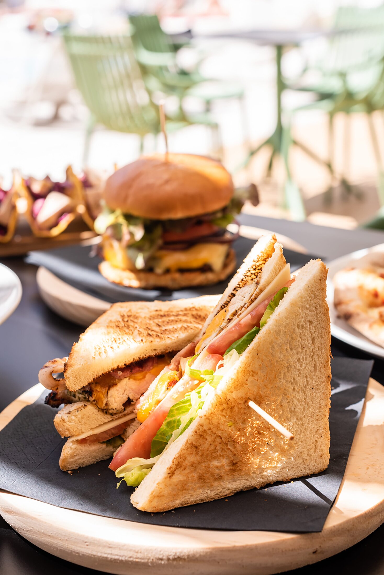 club sandwich and classic burger at the chill out pool
