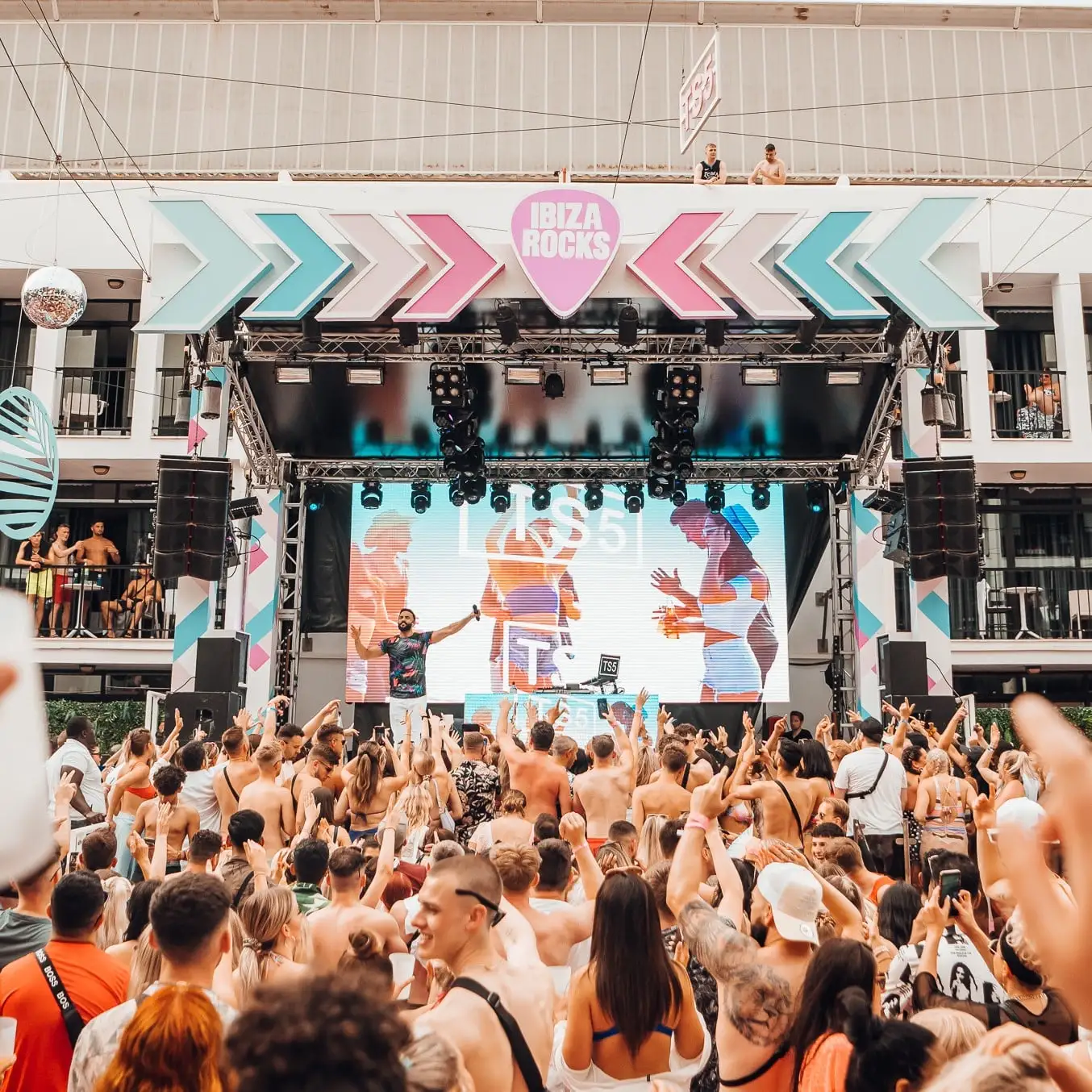 Website Carousel | View from back of crowd of Craig David TS5 Pool Party at Ibiza Rocks Hotel 2022