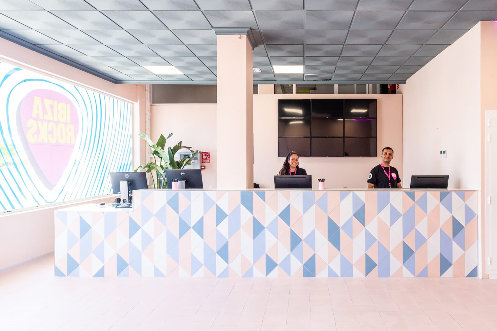 hotel reception check in desk with staff