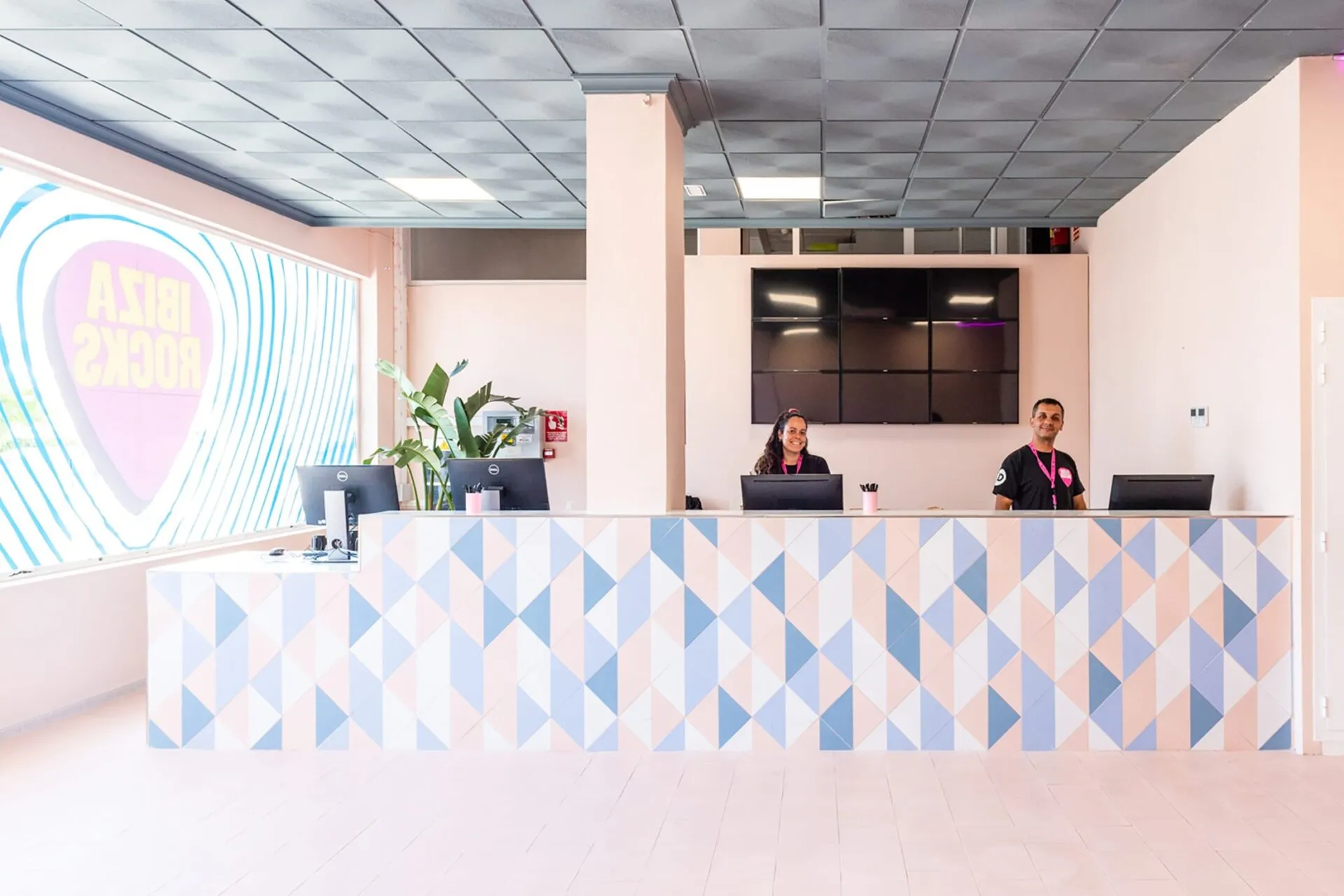 hotel reception check in desk with staff