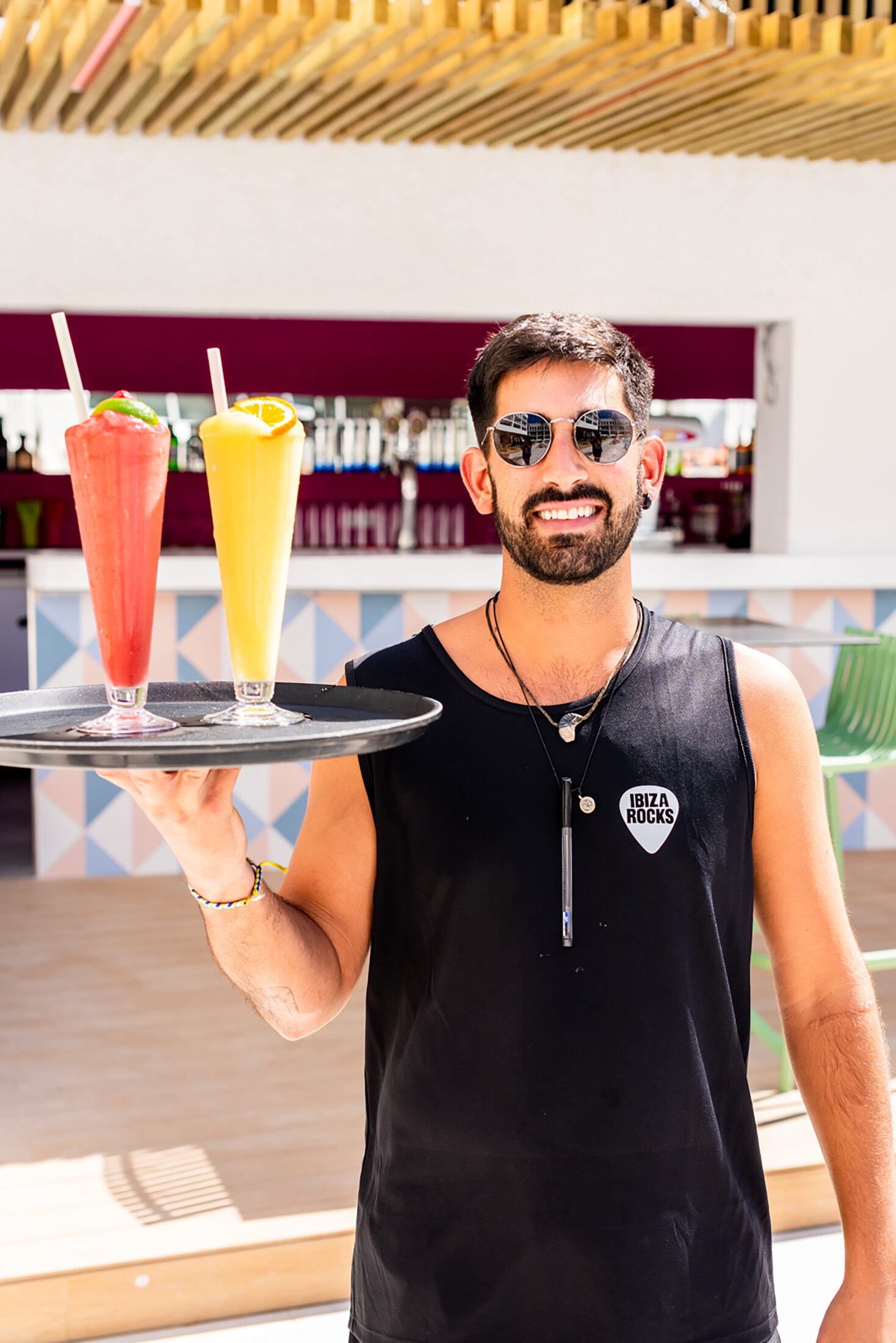 ibiza rocks staff with strawberry and mango daiquiri