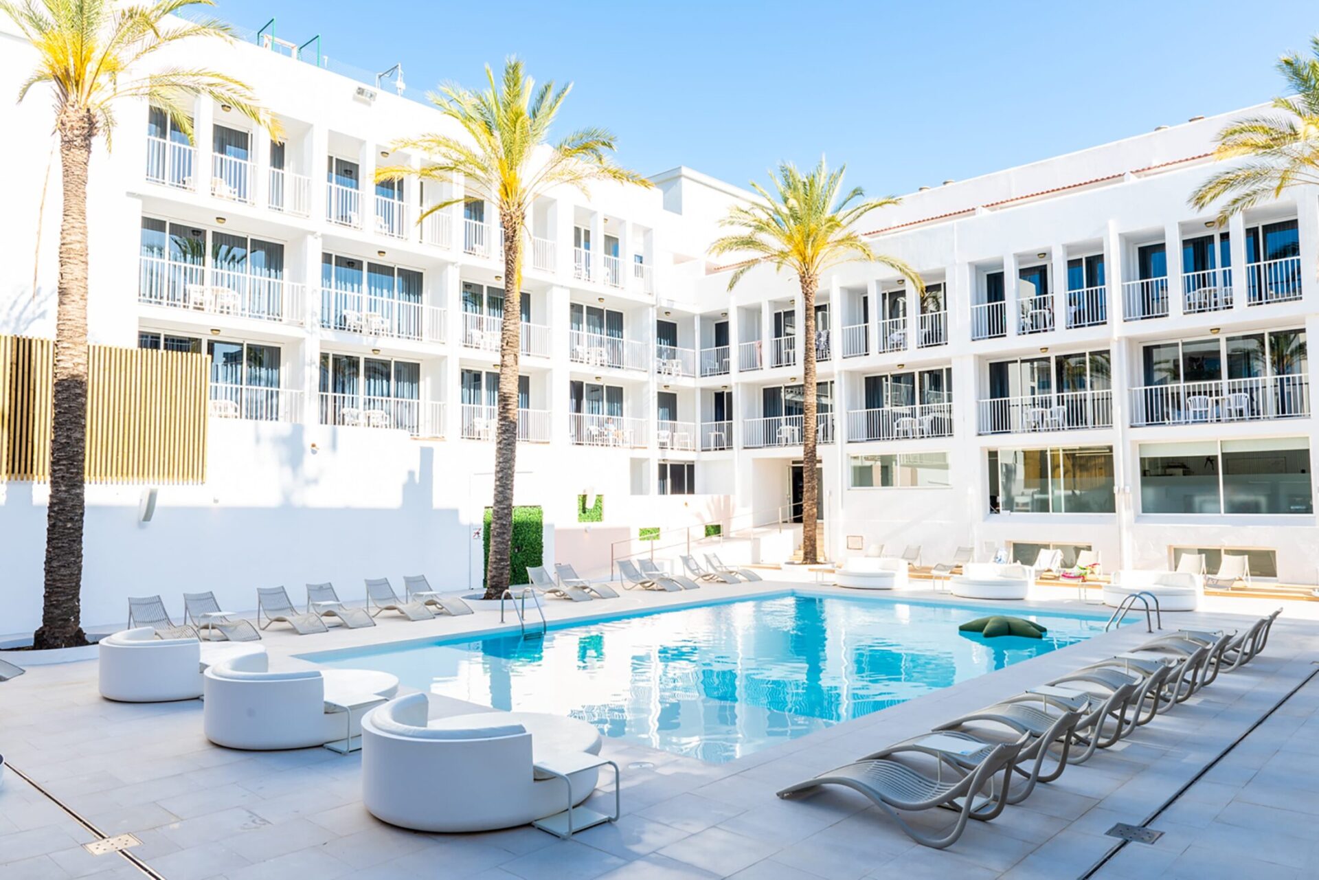 the chill out pool at ibiza rocks hotel with day beds and sunloungers