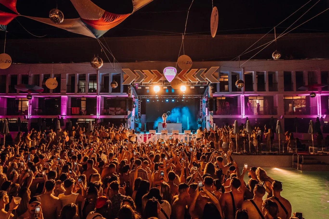Aitch on stage at Aitch20 Pool Party Ibiza Rocks