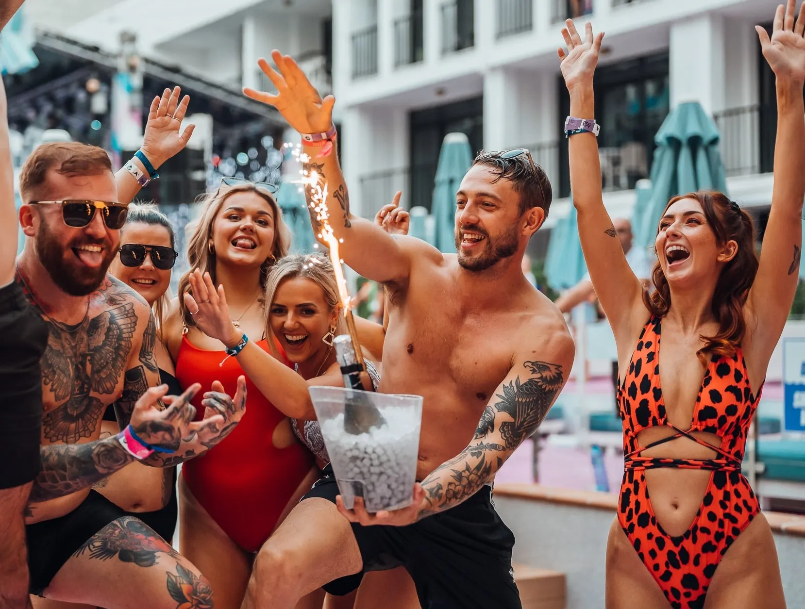 Boy & Girl Group on VIP Party Deck with Champagne