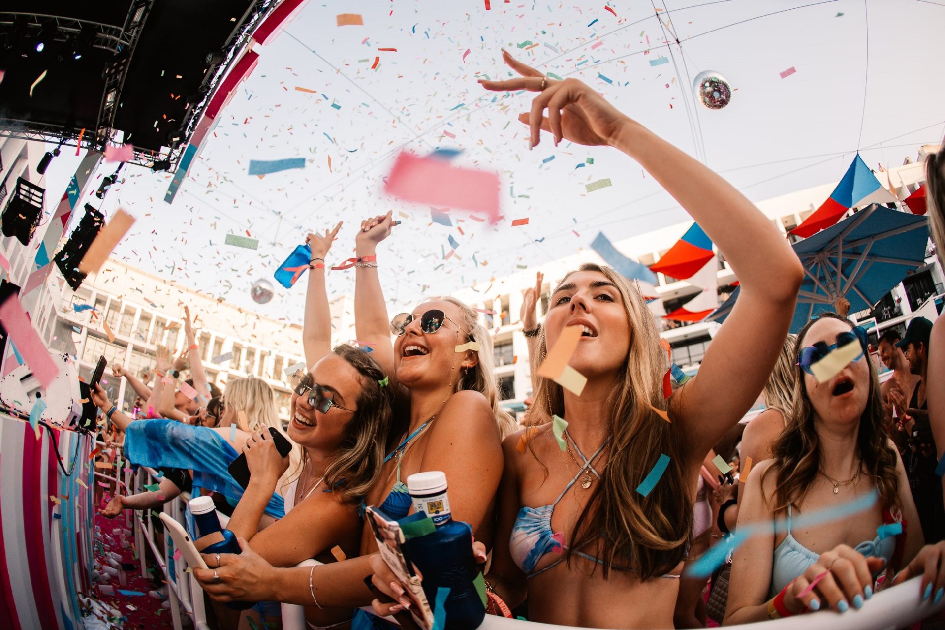 Girls front row of Ibiza Rocks dancefloor | Ibiza May Events 2023