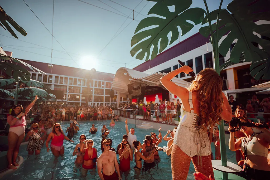 Ibiza Rocks Opening Party Deals - Becky Hill singing from VIP Pool Bed Pool Party